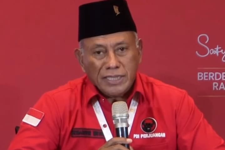 Komarudin Watubun.