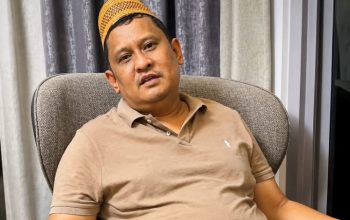 Khairul Umam alias Haji Her.