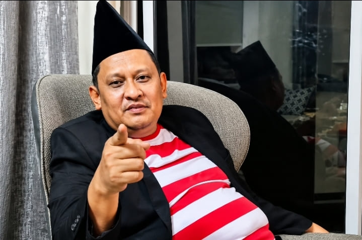 Khairul Umam alias Haji Her.