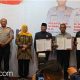Penandatanganan Pakta Kesepahaman dan Komitmen Bersama oleh sejumlah ormas dan Forkopimda Jawa Timur.