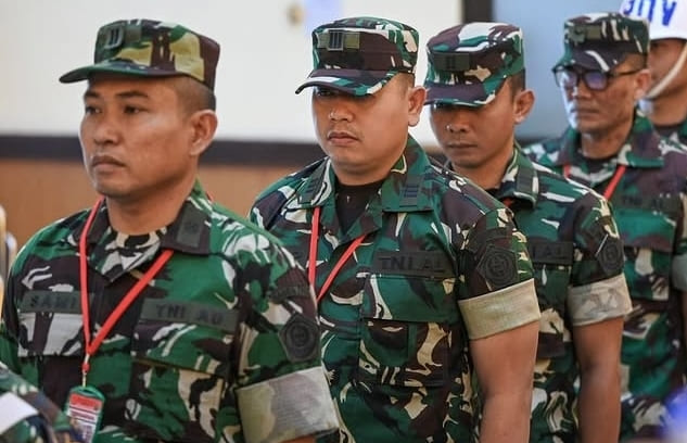 4 terdakwa kasus penyiraman air keras terhadap aktivis KontraS Andrie Yunus. [Foto: Antara]
